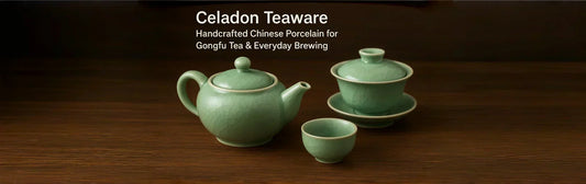 A handcrafted Longquan celadon teaware set featuring a jade-green teapot, gaiwan, and cups with crackle glaze, elegantly displayed on a wooden surface