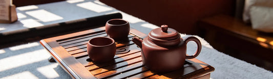 A complete teaset featuring a teapot and teacups, showcasing modern and traditional styles for home use, tea ceremonies, and gifting
