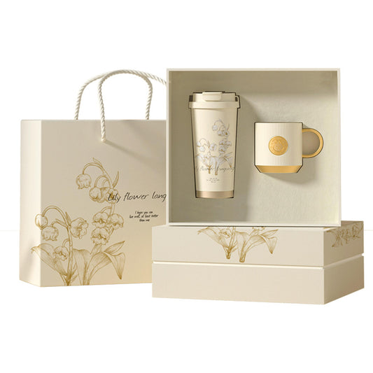 Gift box set with insulated tumbler and ceramic mug for hot and cold drinks
