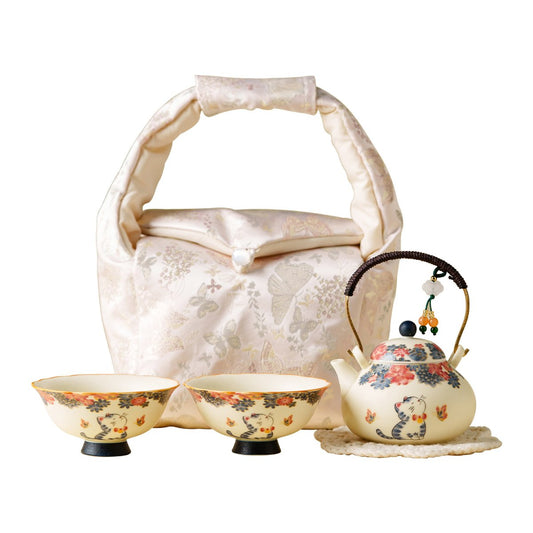 White mineral porcelain gongfu tea set with cat teapot and two cups, travel bag included