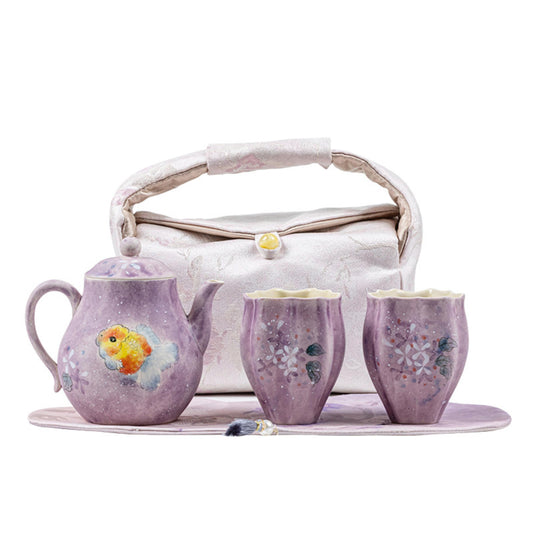 Handcrafted purple porcelain travel tea set with goldfish teapot, two cups, tea mat, and brocade bag – Zilin Siyuan design