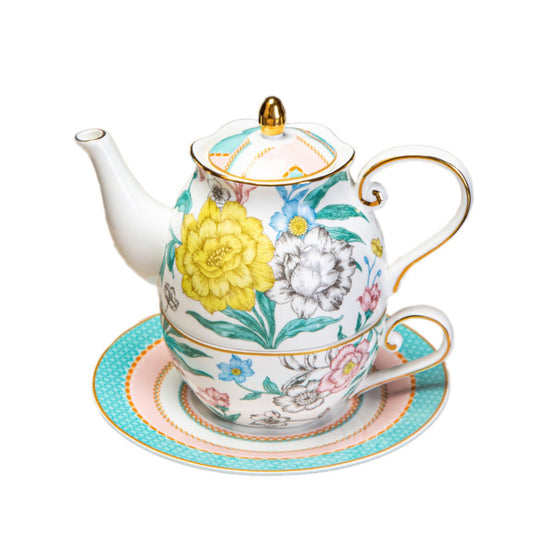 Bone china tea-for-one set with stackable teapot, cup, and saucer featuring floral pattern and gold trim