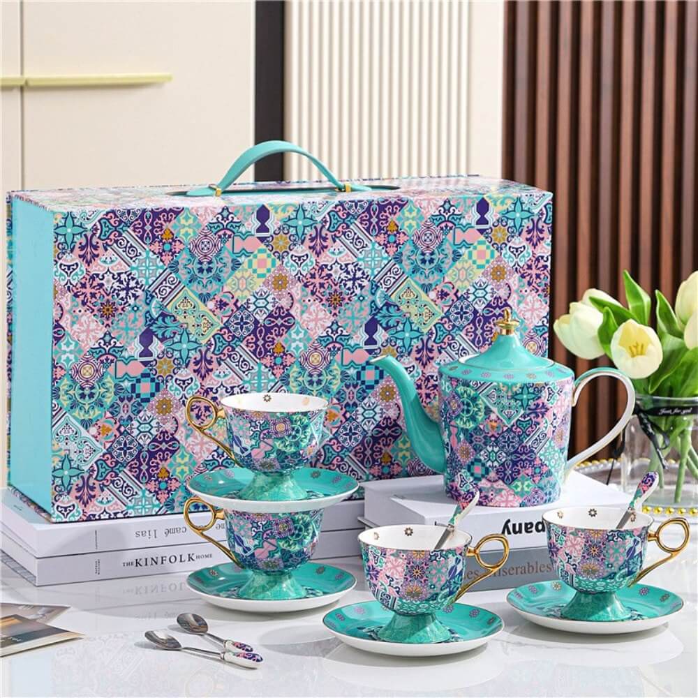 Luxury bone china afternoon tea set with teapot, high footed cups, saucers and gold rim details